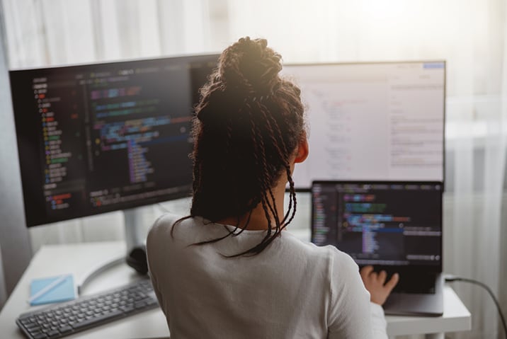 Woman sitting at computer